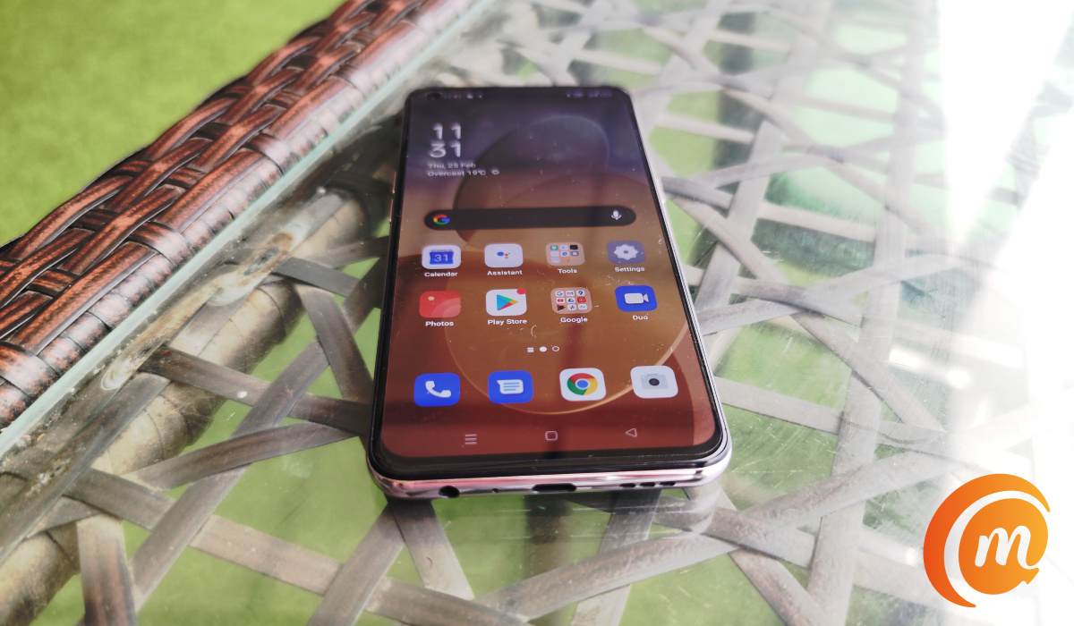 oppo Reno5 4g on glass table