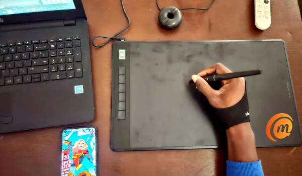 the Huion Inspiroy Giano G930L drawing tablet and pen in use