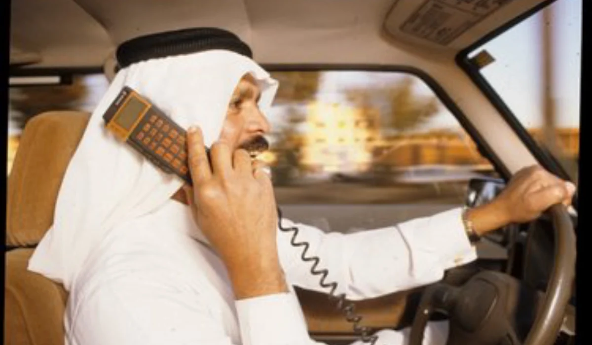 An Ericsson car phone in use 